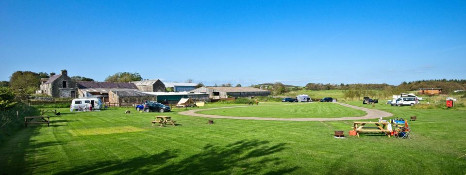 Camping field and farm buildings