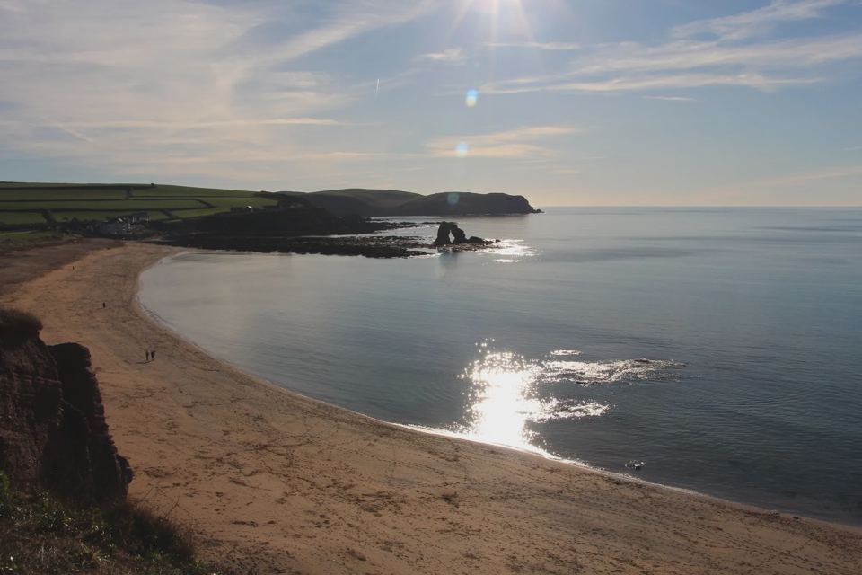 Sandy bay at low sun