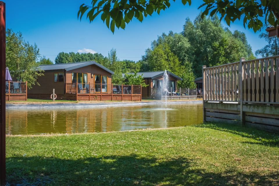 Lodges by a small lake