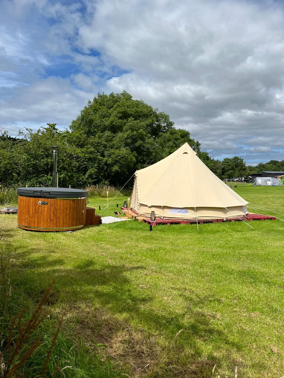 Bell tent with a hot tub