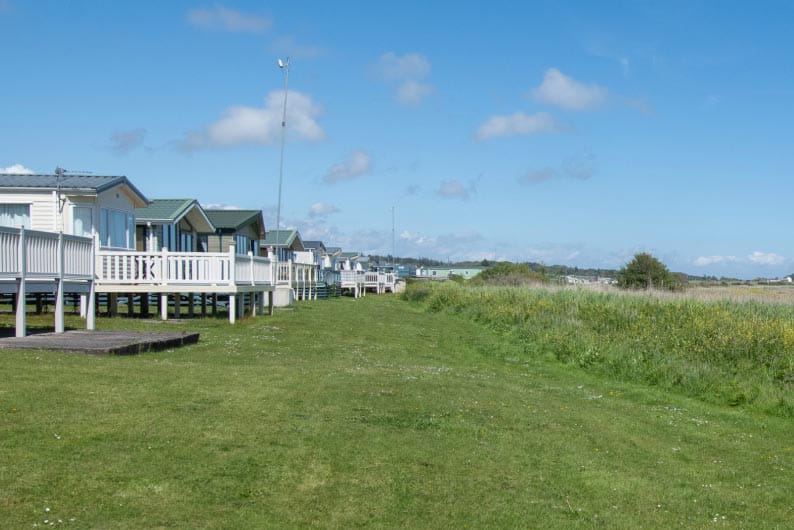 Row of caravans on the grass