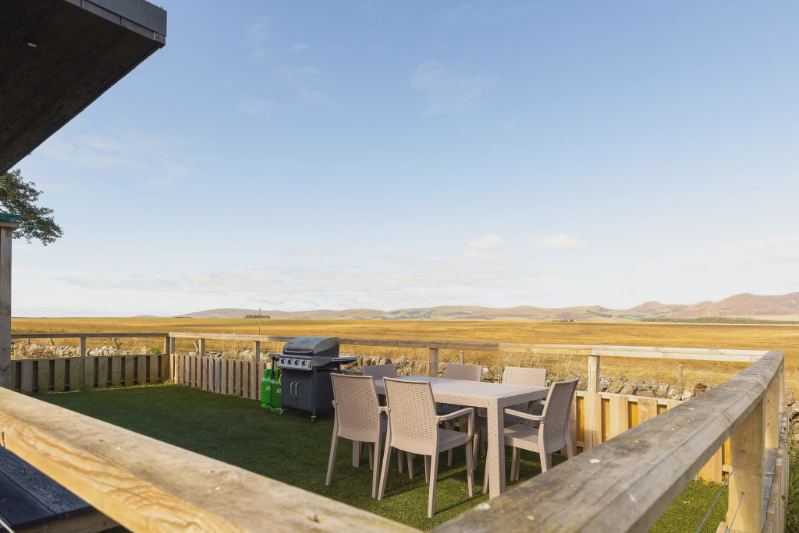 Deck and barbecue looking over the hills