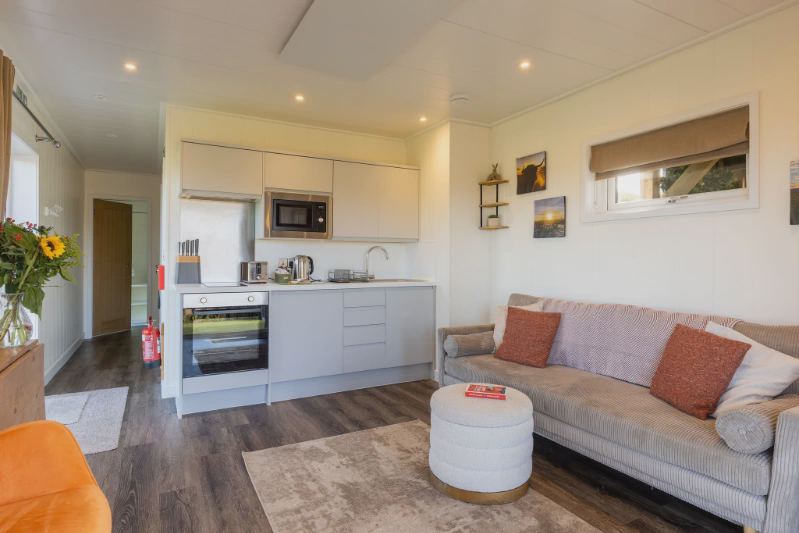 Kitchen and sofa area