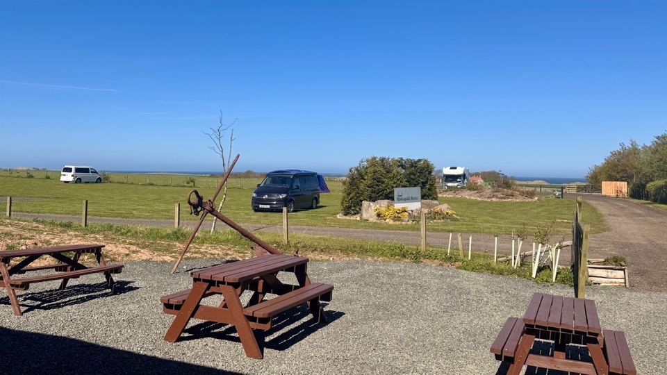 Picnic benches and sea view