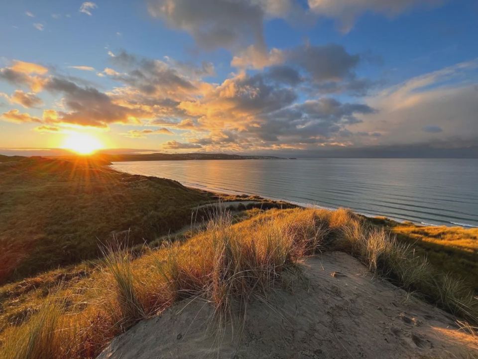 Sunset over the dunes and bay