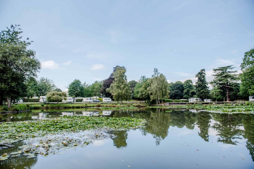 Lake with pitches beyond