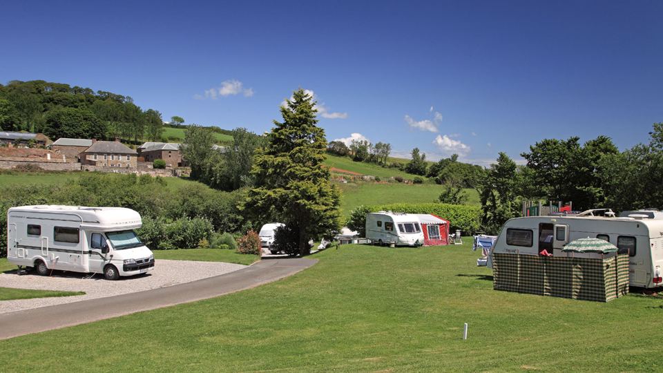 Motorhome and caravans on the grass