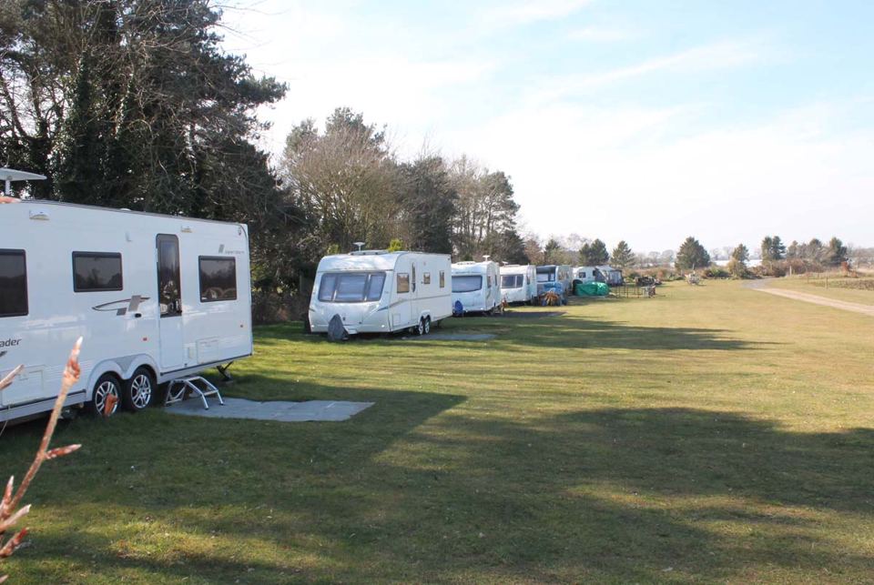 Caravans on the open grass