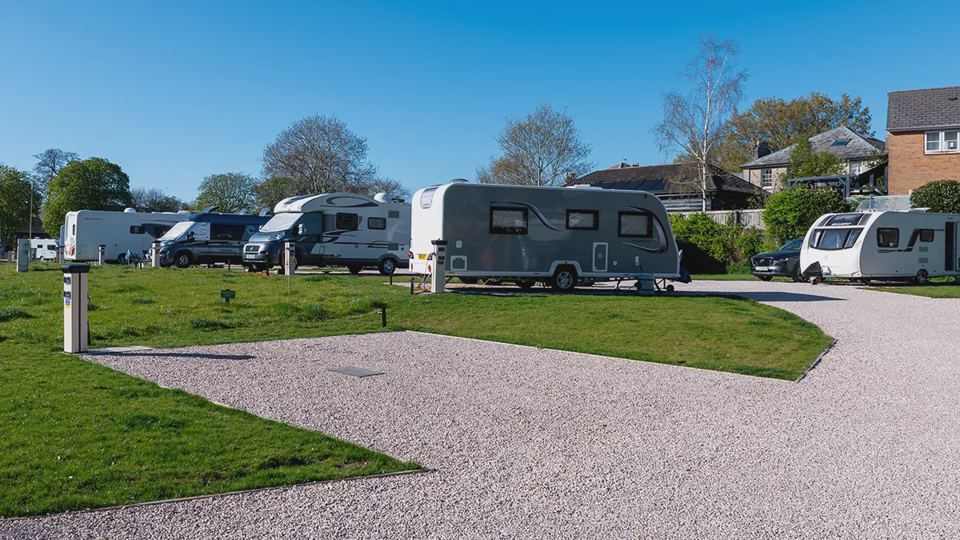 Caravans and motorhomes on gravel pitches