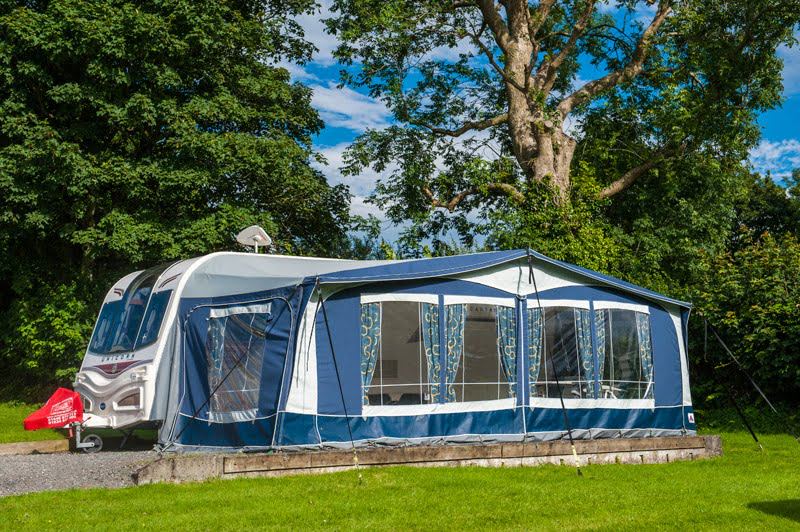 Caravan with awning on a pitch