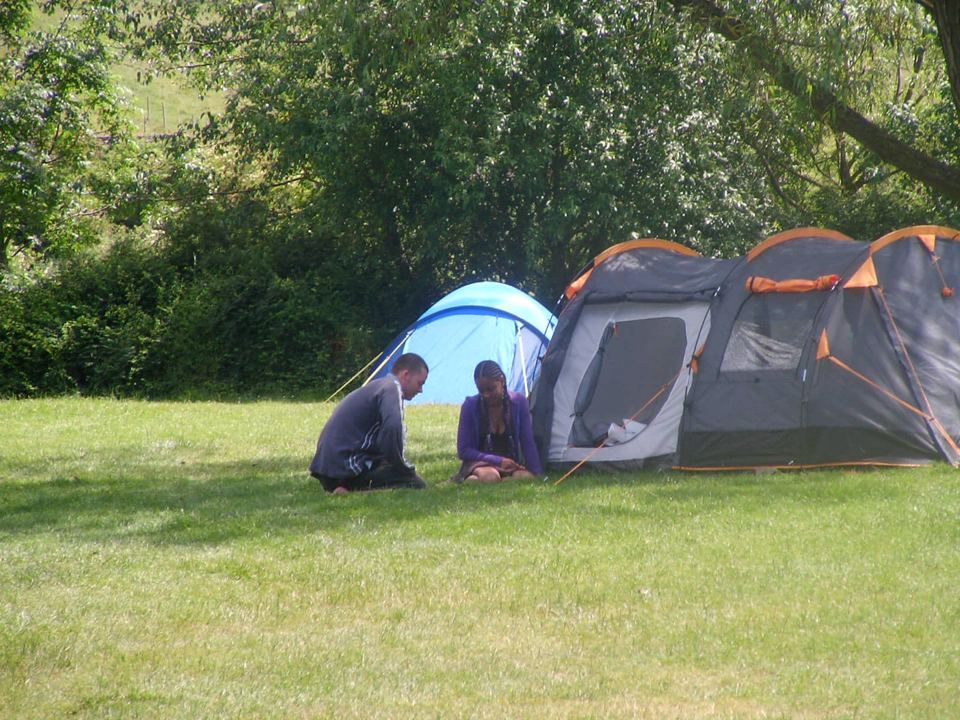 Tents on the grass field