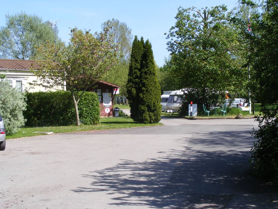 Tarmac road past the pitches