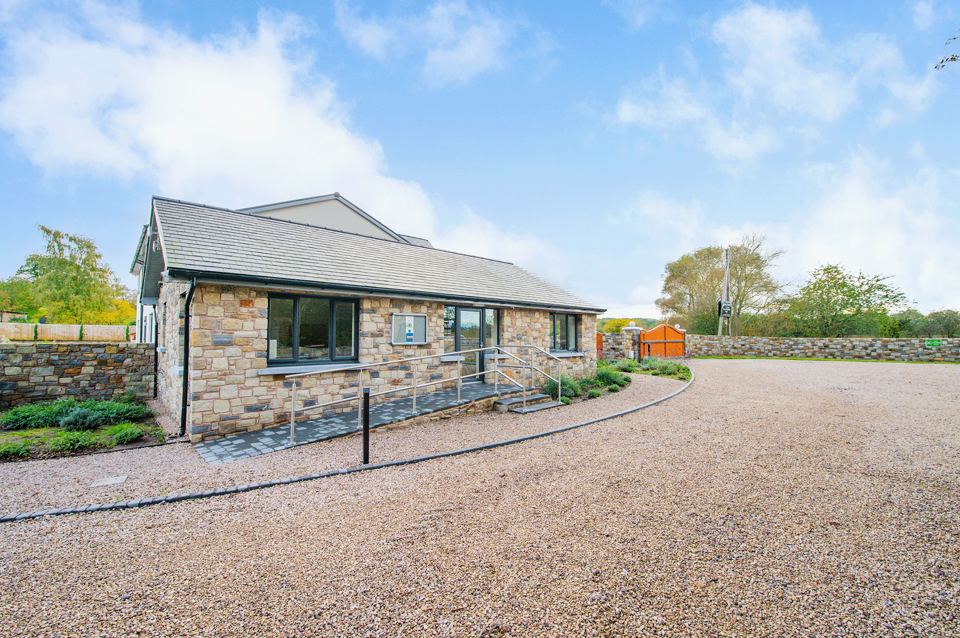 Amenity building and gravel drive