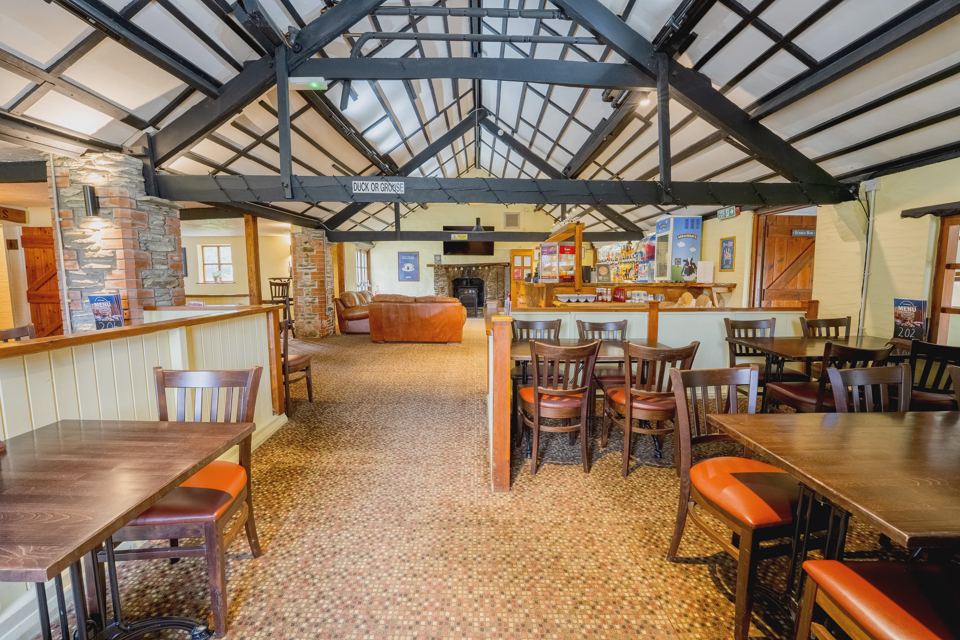 Bar with tables and seating