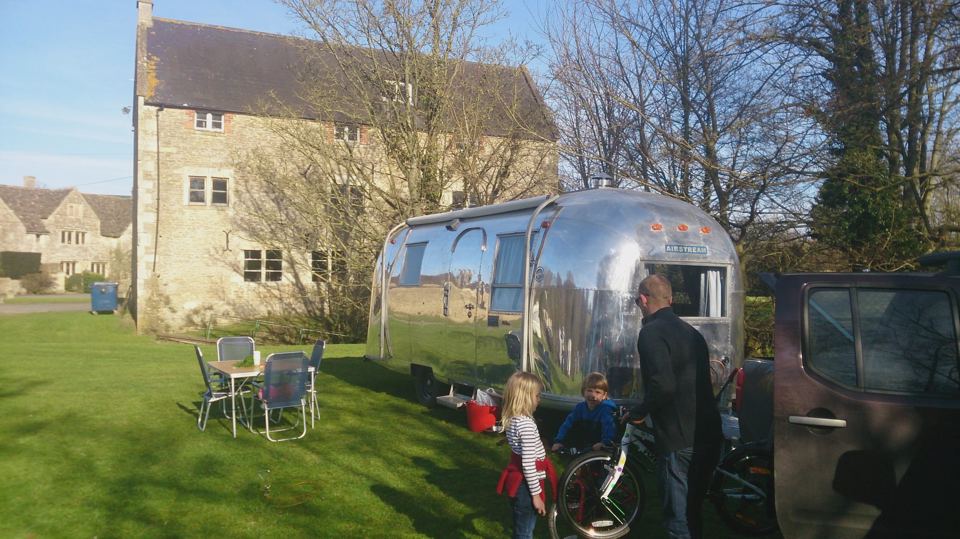 Airstream by the farm buildings