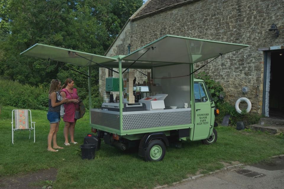 Pizza van beside the barn