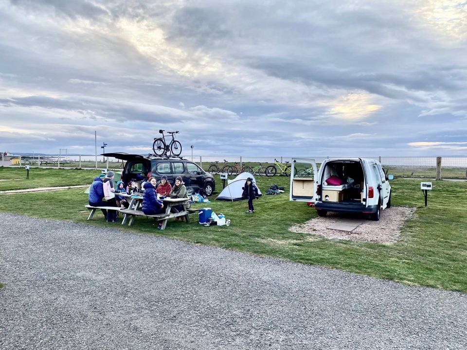 Campers by the gravel track