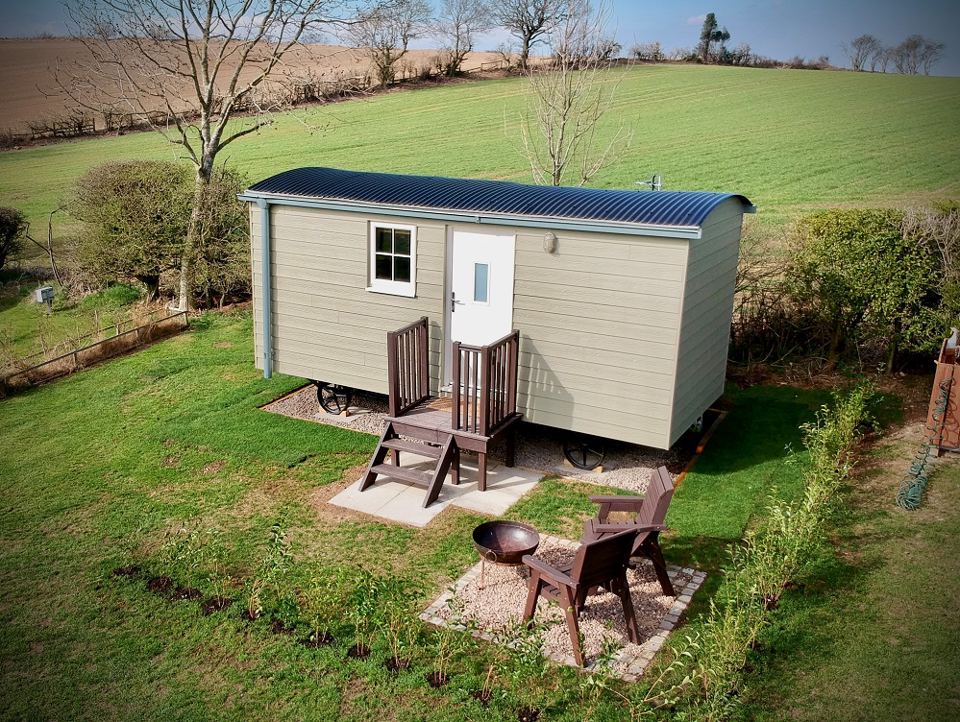 Shepherd's hut with fire pit