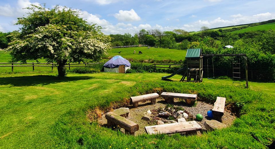 Yurt, fire pit and play frame