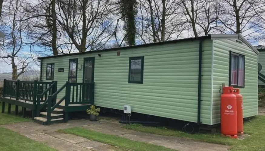 Static caravan with decking