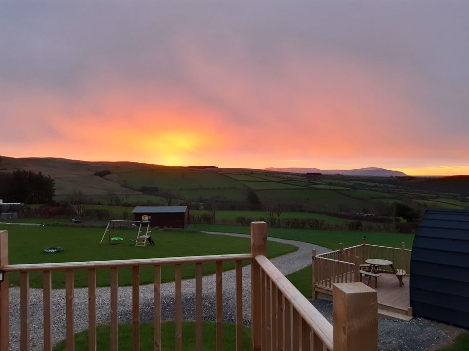 Pods and decking at sunset