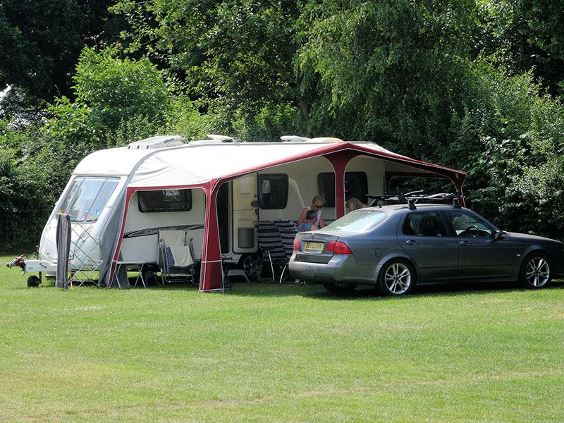 Caravan and awning on grass
