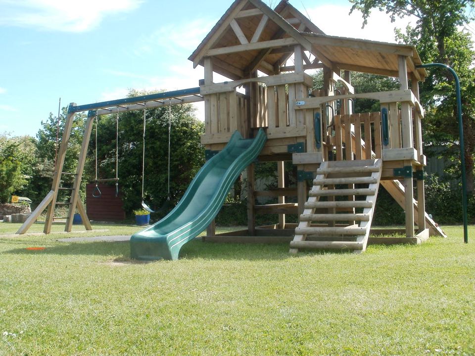 Wooden play frame and slide
