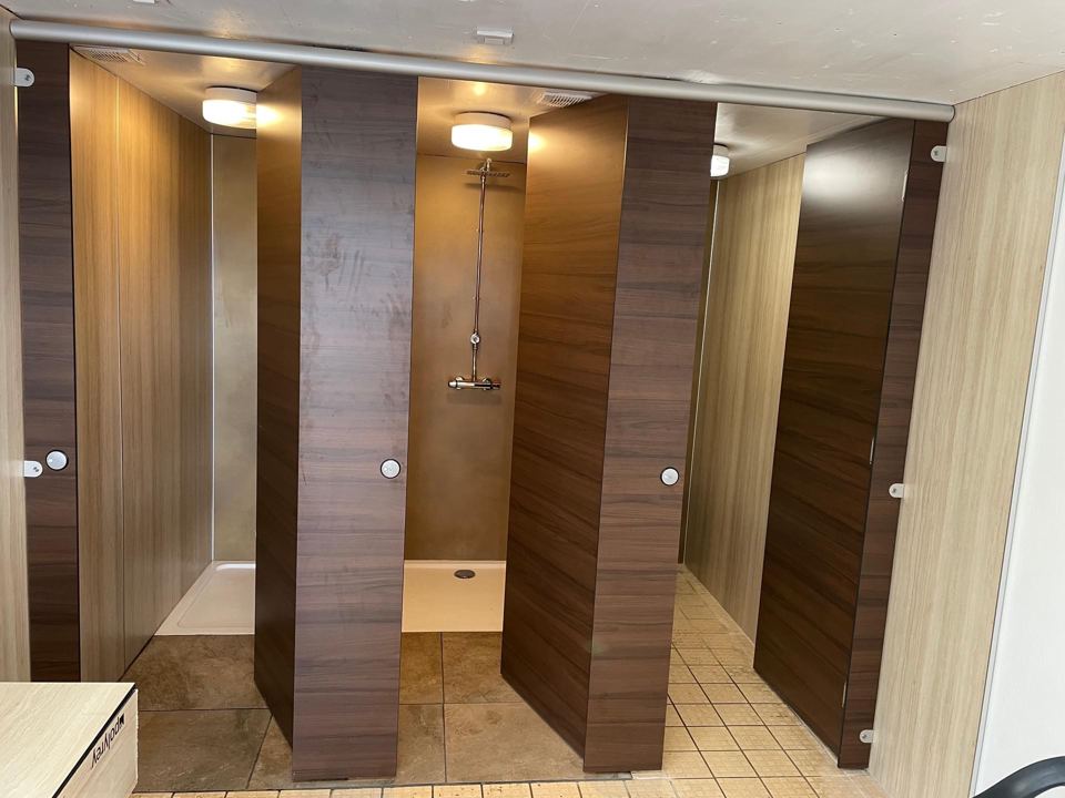 Shower cubicles with wood panels