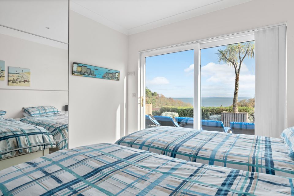 Twin room with patio doors