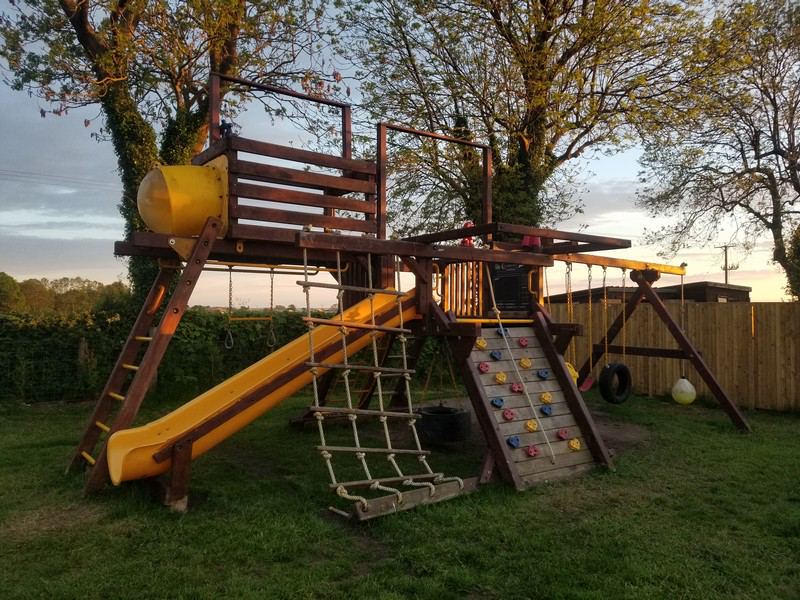 Climbing frame and slide