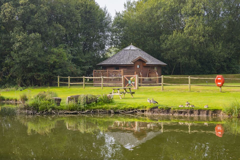 Hexagonal cabin across the lake