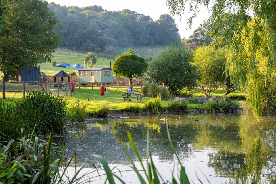 Lake with play area and tents