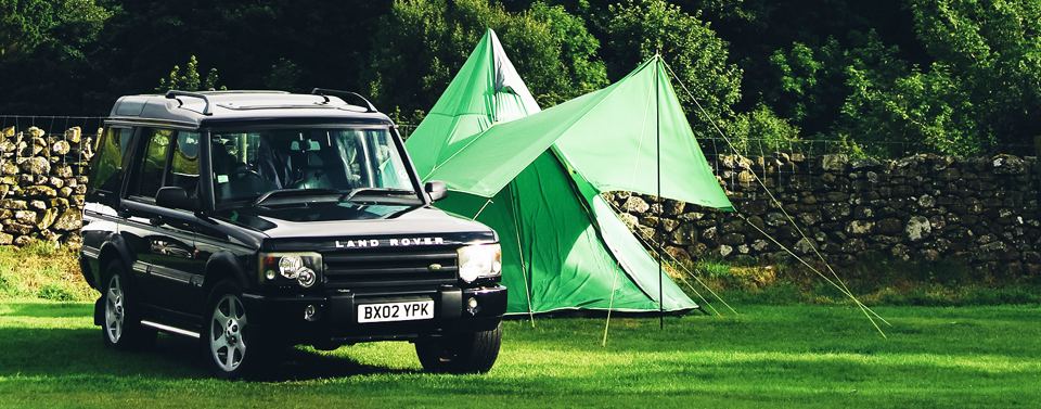 Tent and 4x4 on the grass