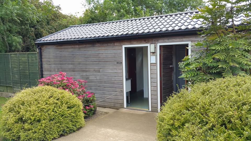 Toilet and shower block
