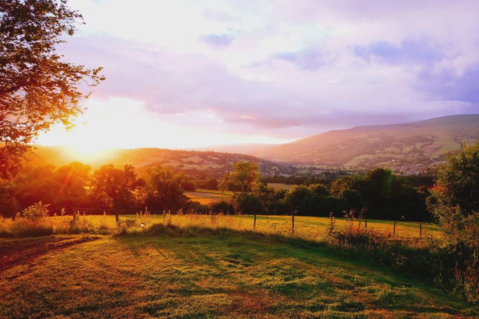 Sunset over the campsite field