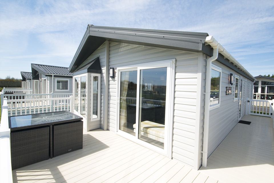 Caravan with hot tub on decking