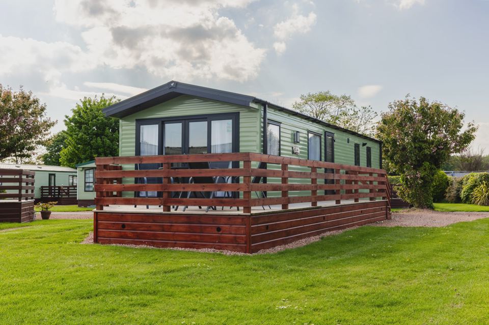 Static caravan with decked veranda