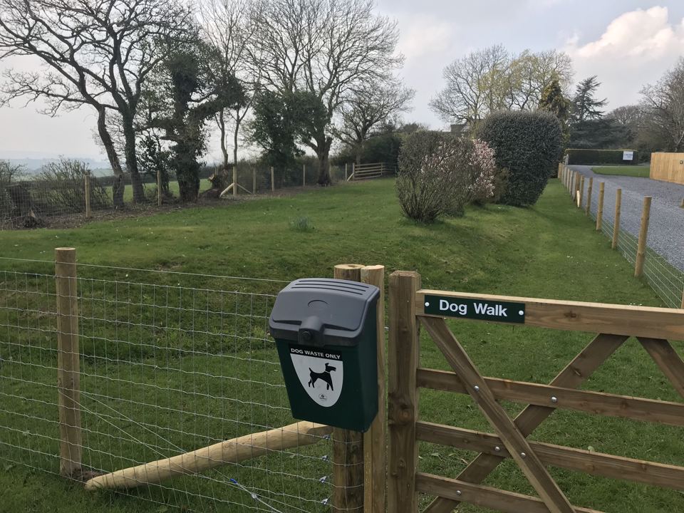 Dog walk gate and bin