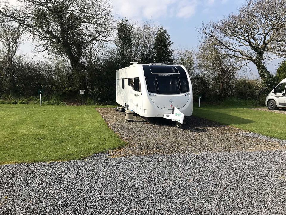 Caravan on the gravel pitch