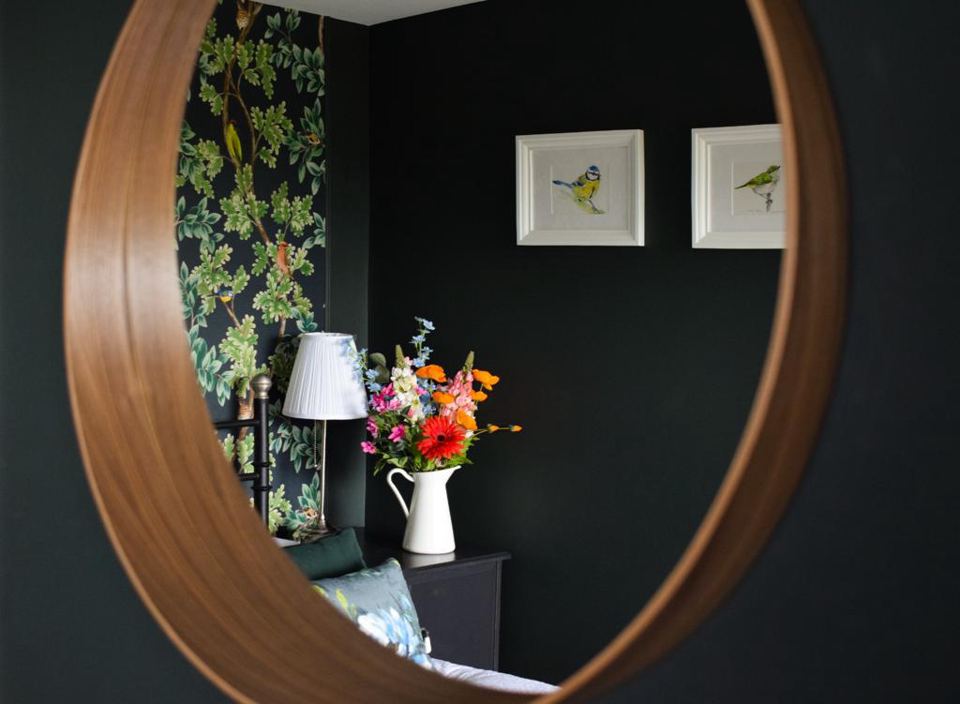 Bedroom with bird prints