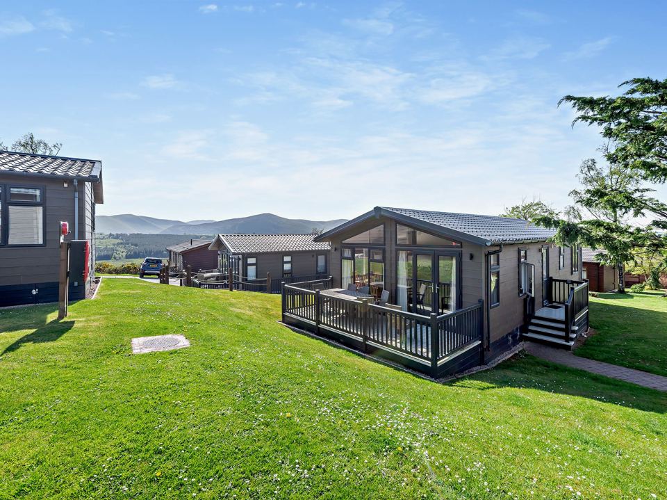 Lodge exterior with the fells beyond