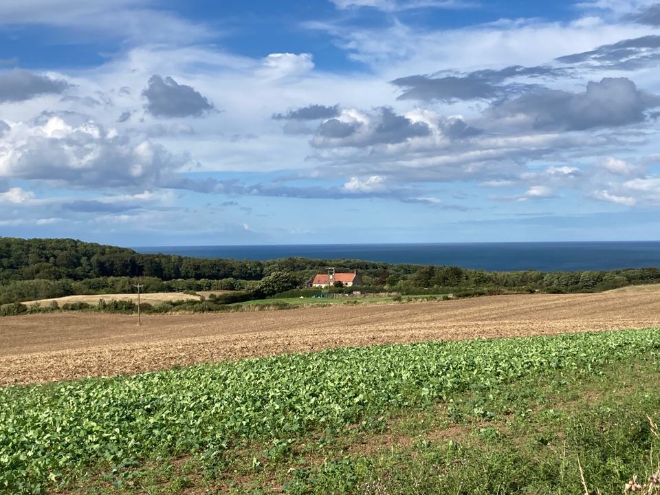 Fields down to the sea