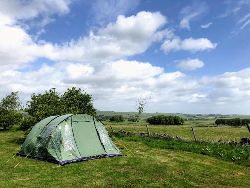 Tent pitched with countryside views