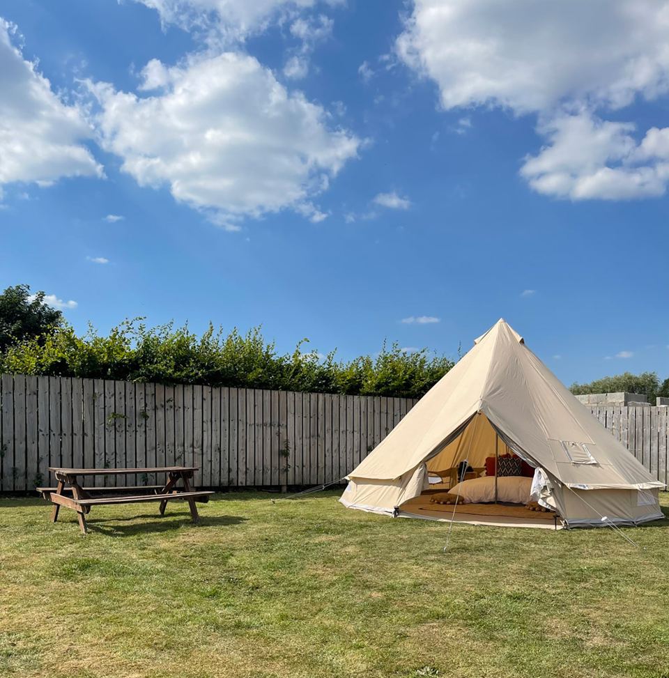 Bell tent with picnic table