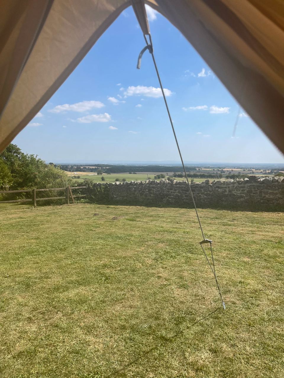 View over fields from a bell tent