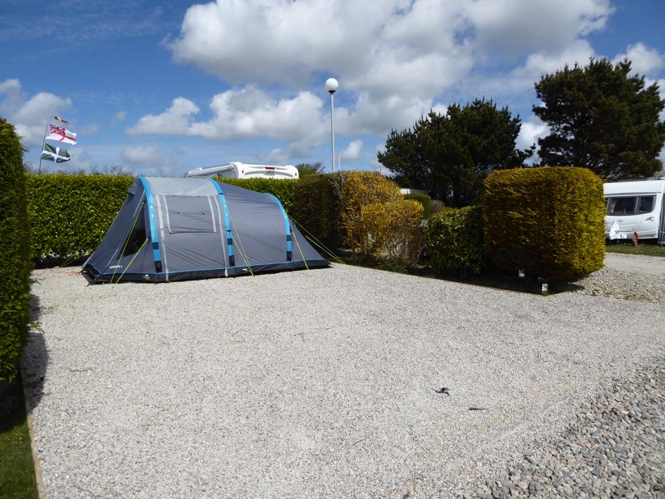 Tent pitched on the gravel