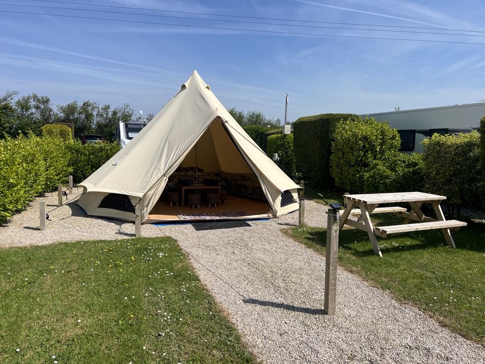 Bell tent with picnic bench
