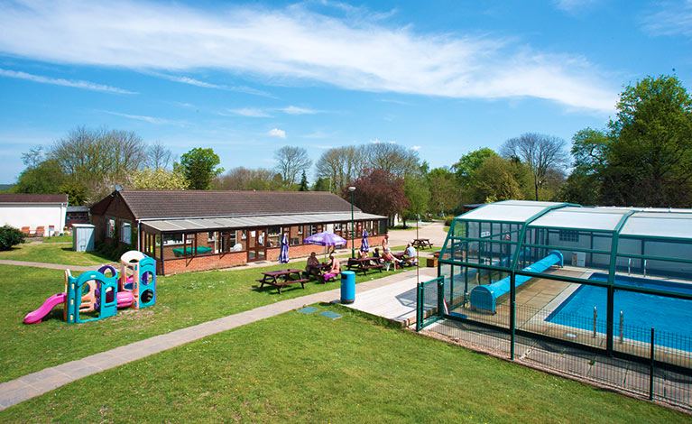 Play area beside the pool