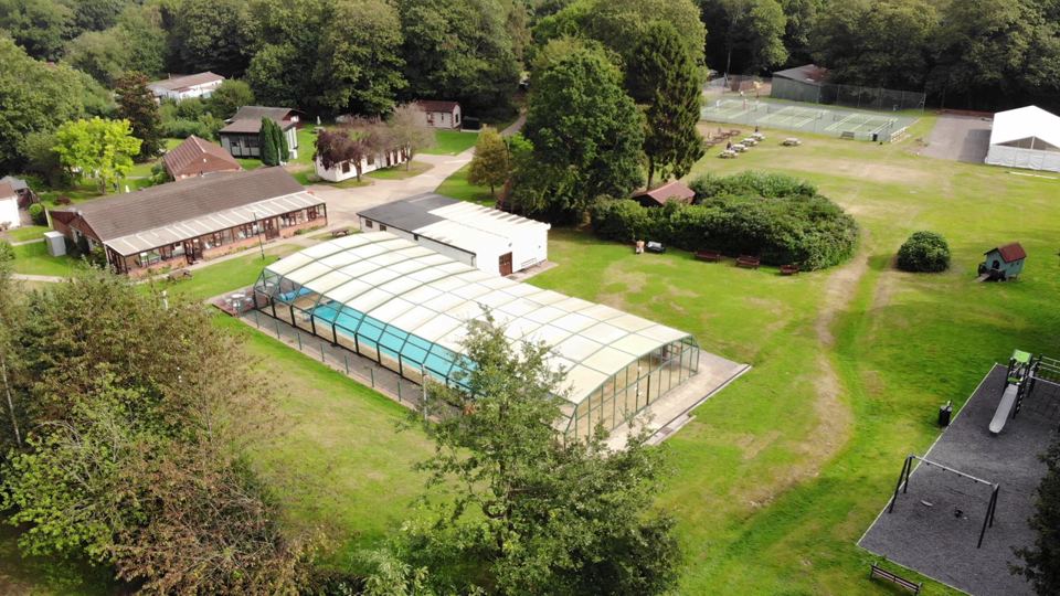 Covered pool and grounds from above