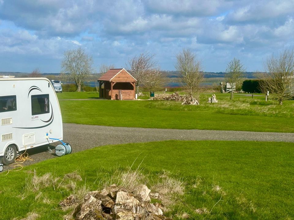 Caravan pitch looking to the reservoir